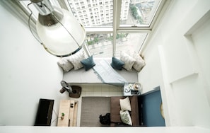 Deluxe Loft | Living area - Indigo Ortigas @ Eton Emerald (Pasig)