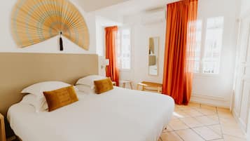 Triple Room | 1 bedroom, minibar, in-room safe, individually decorated