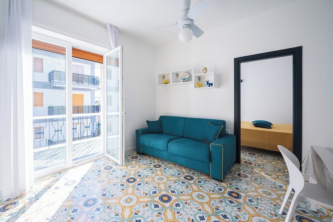 Superior-Apartment, 1 Queen-Bett und Schlafsofa | Wohnbereich | Flachbildfernseher