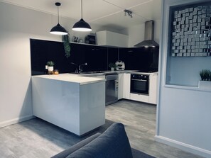 House, 3 Bedrooms | Private kitchen | Highchair - Pratt Holiday Home (South Mackay)