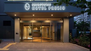 The exterior of Shizuotsu Hotel Prezio with a modern design, featuring a prominent entrance and a clear sign. - Shizutetsu Hotel Prezio Tokyo Tamachi (Tokyo)