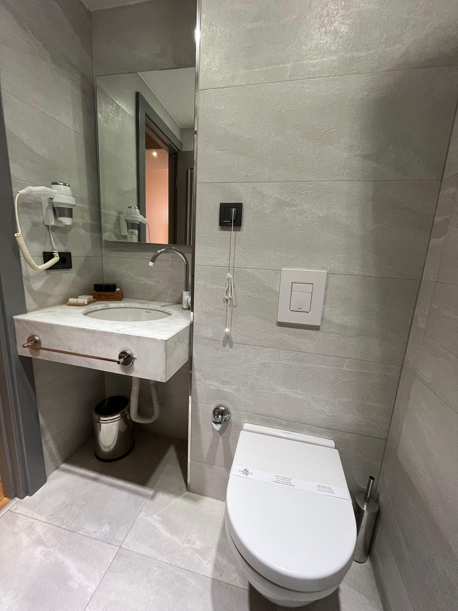 shower, rainfall showerhead, hair dryer, slippers