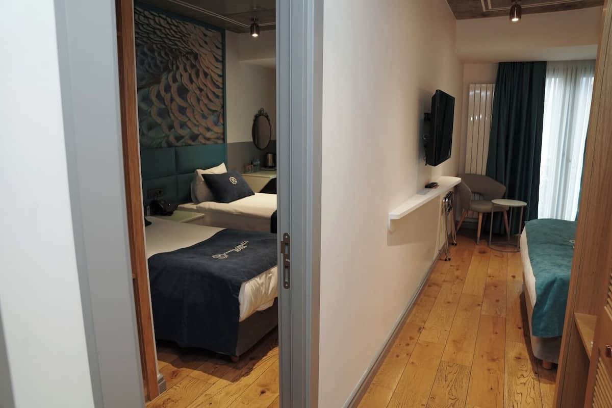 Familiekamer | Hypoallergeen beddengoed, een minibar met enkele gratis items