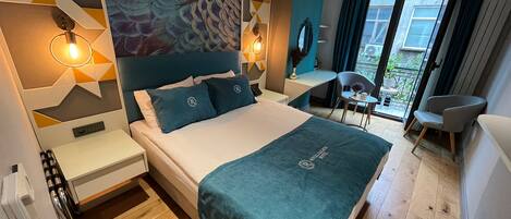 Hypo-allergenic bedding, free minibar items, in-room safe