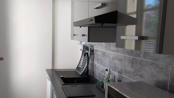 Een koelkast, een microgolfoven, een kookplaat