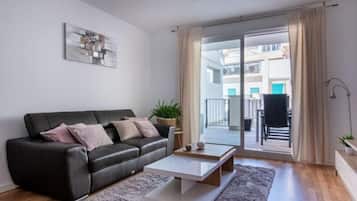 Apartemen, 2 kamar tidur | Area keluarga | TV layar datar