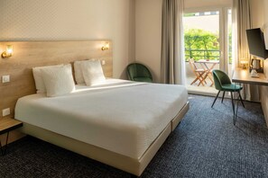 Habitación estándar, 1 cama King size, para no fumadores, vista al jardín | Decoración personalizada, muebles diferentes y escritorio 