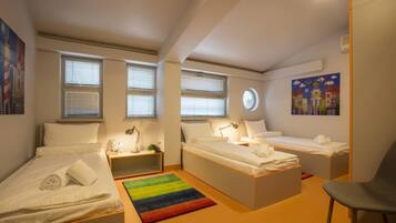 Triple Room | In-room safe, blackout drapes, iron/ironing board, free WiFi