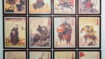 A collection of framed ukiyo-e woodblock prints.