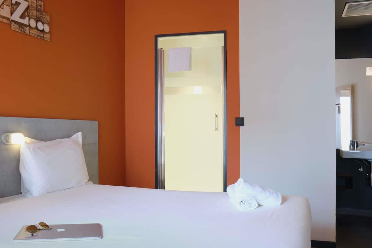 Blackout curtains, soundproofing, free WiFi, bed sheets