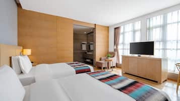 Habitación Deluxe, 2 camas individuales | Caja de seguridad en la habitación, escritorio y insonorización
