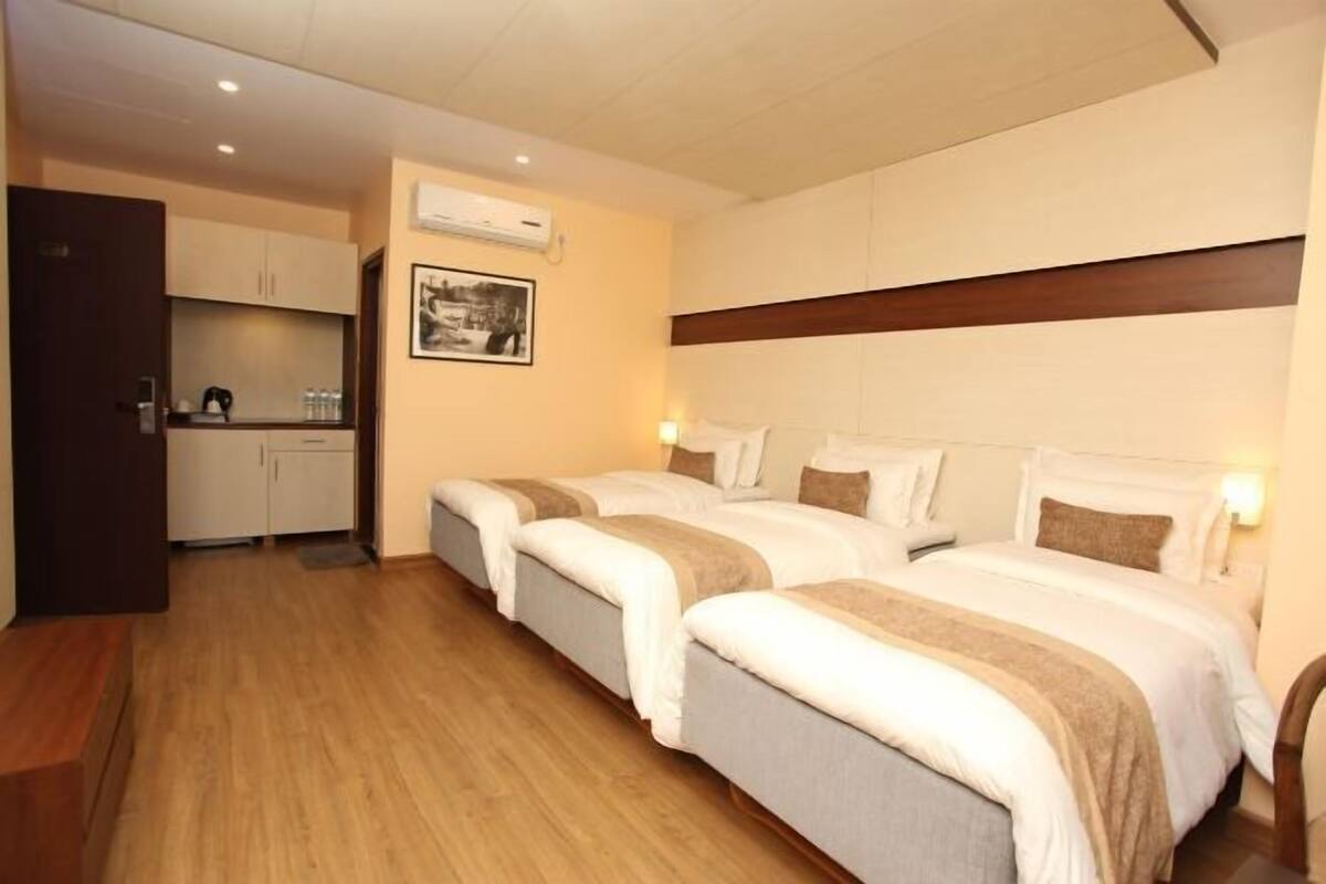 Minibar, desk, laptop workspace, blackout curtains