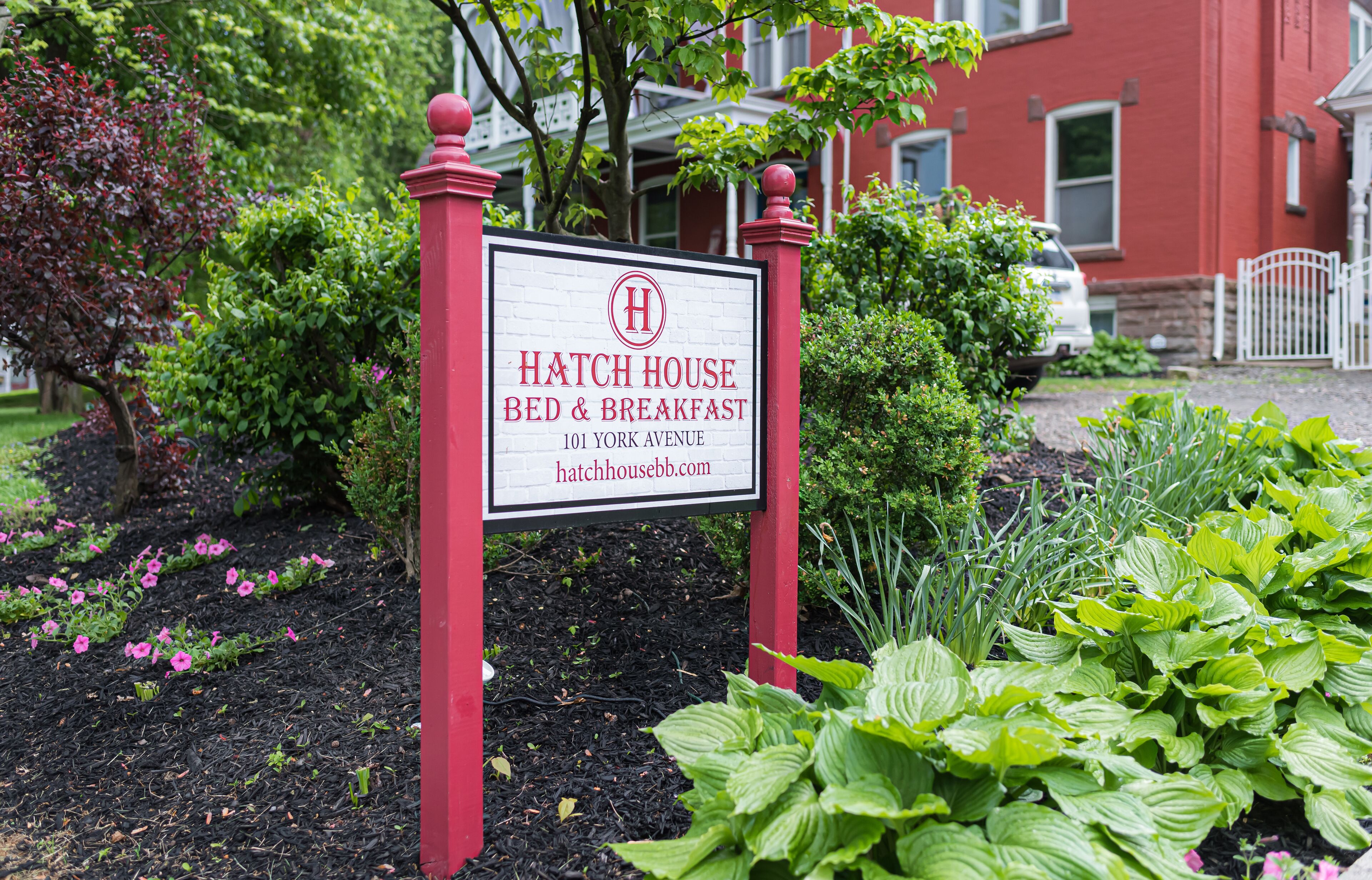 A sign for a bed and breakfast named 'Hatch House' located at 101 York Avenue.