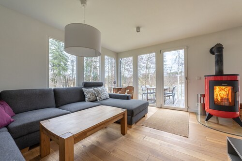 Baking with lake view, sauna + fireplace + boat + 2500sqm garden