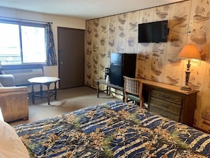 Desk, laptop workspace, free WiFi, bed sheets