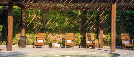 Outdoor pool, pool umbrellas, sun loungers