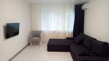 Classic Apartment | Memory-foam beds, desk, laptop workspace, blackout curtains