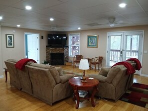 Smart TV, fireplace, DVD player, books