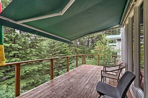 Cool off on the patio under the retractable awning and look out at wild Alaska