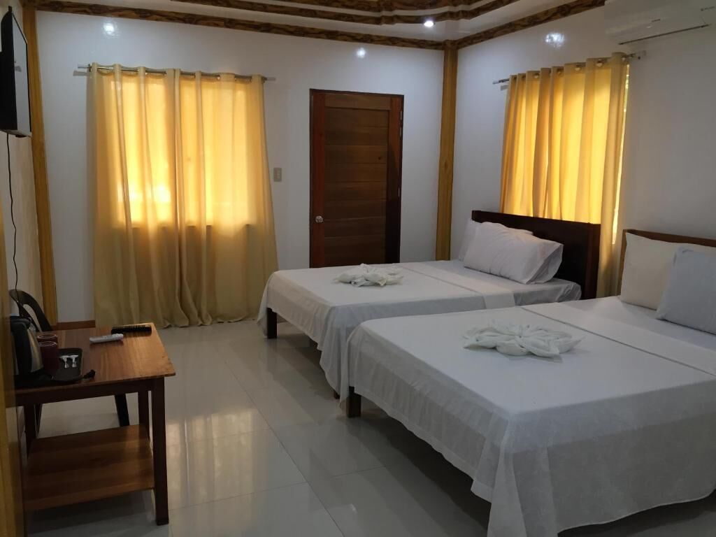 Habitación estándar, 2 camas Queen size | Escritorio, wifi gratis y ropa de cama 