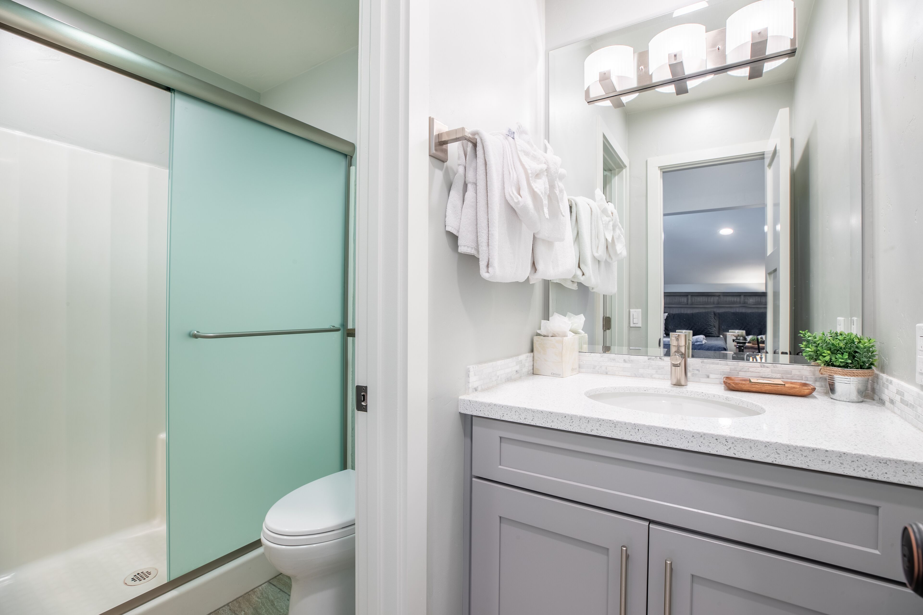 Combined shower/tub, hair dryer, towels, soap