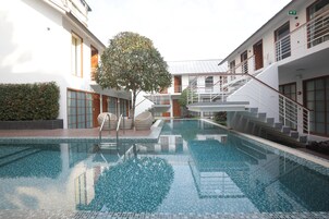 Outdoor pool, open 7:00 AM to 8:00 PM, sun loungers