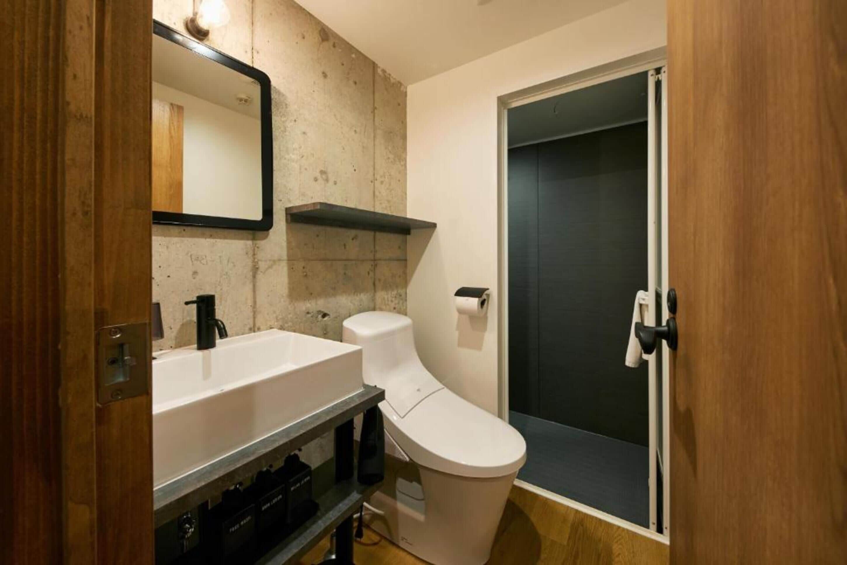 comfort quadruple room, multiple beds, non smoking | bathroom | shower, slippers, towels