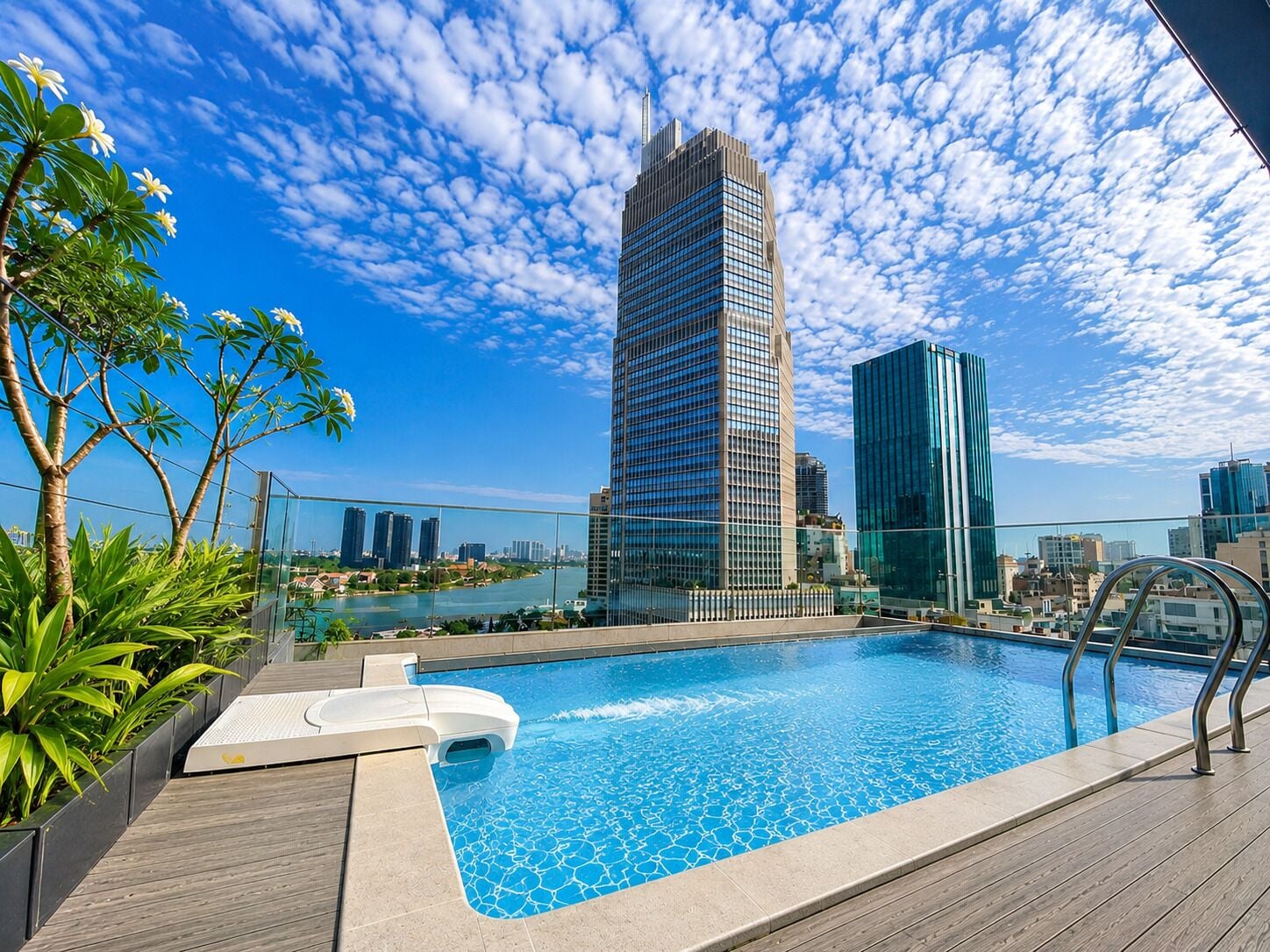 Outdoor pool, open 6:30 AM to 9:30 PM, pool loungers