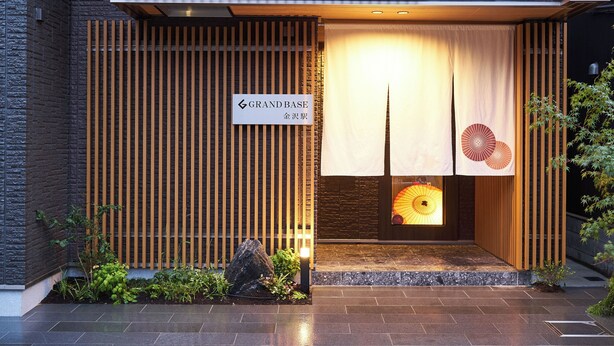 A hotel entrance with a sign reading "GRAND BASE". - Private Hotel Kanazawa SHIKI (Kanazawa)