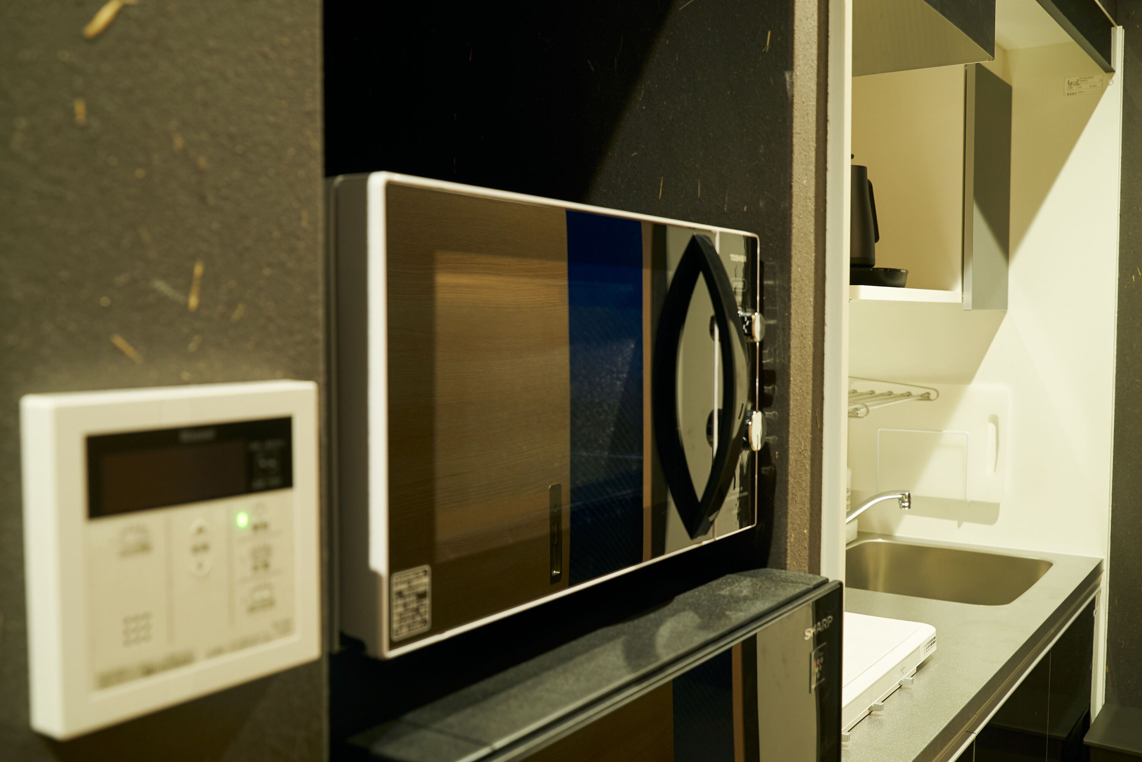 fridge, microwave, stovetop, electric kettle