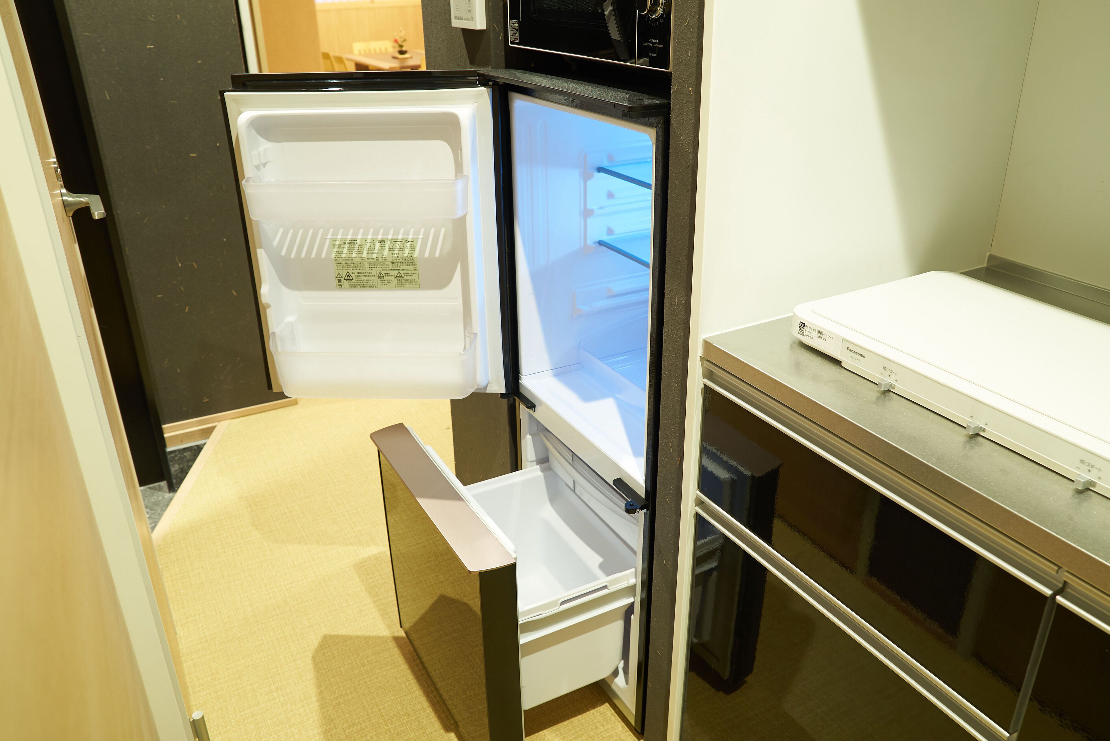 fridge, microwave, stovetop, electric kettle