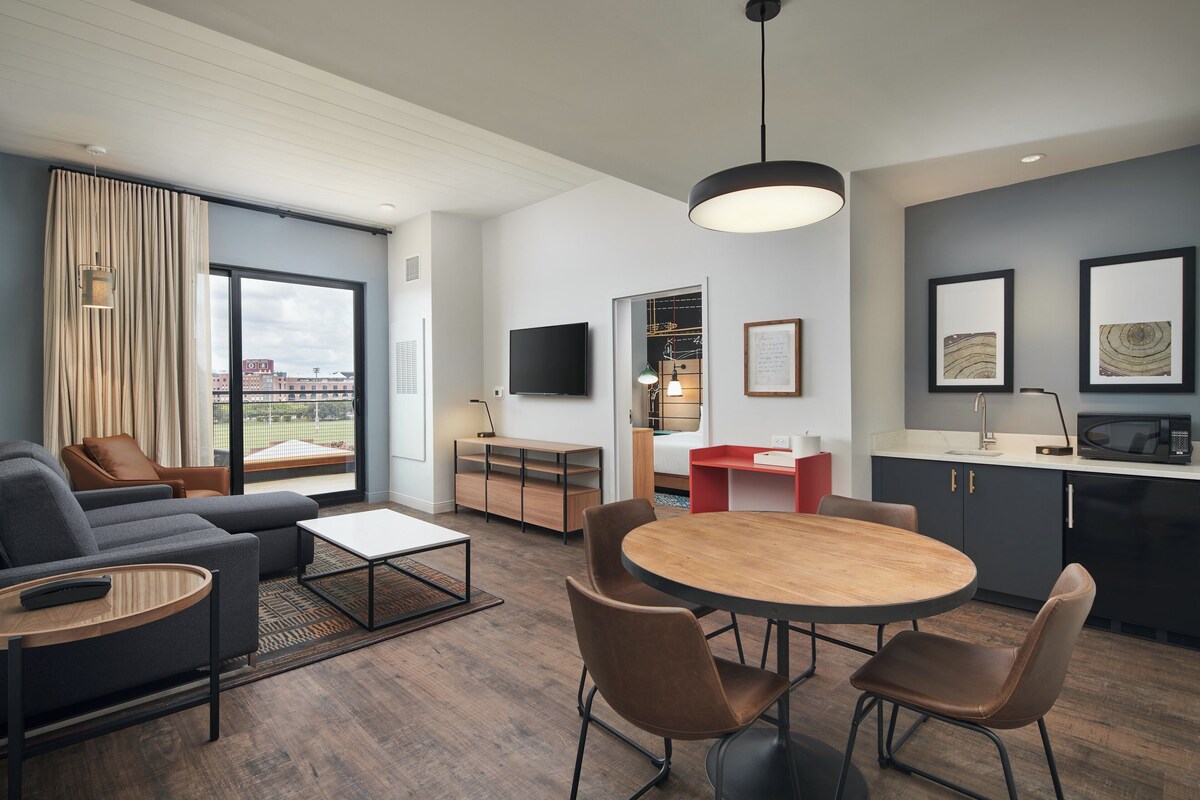 Premium bedding, desk, laptop workspace, soundproofing