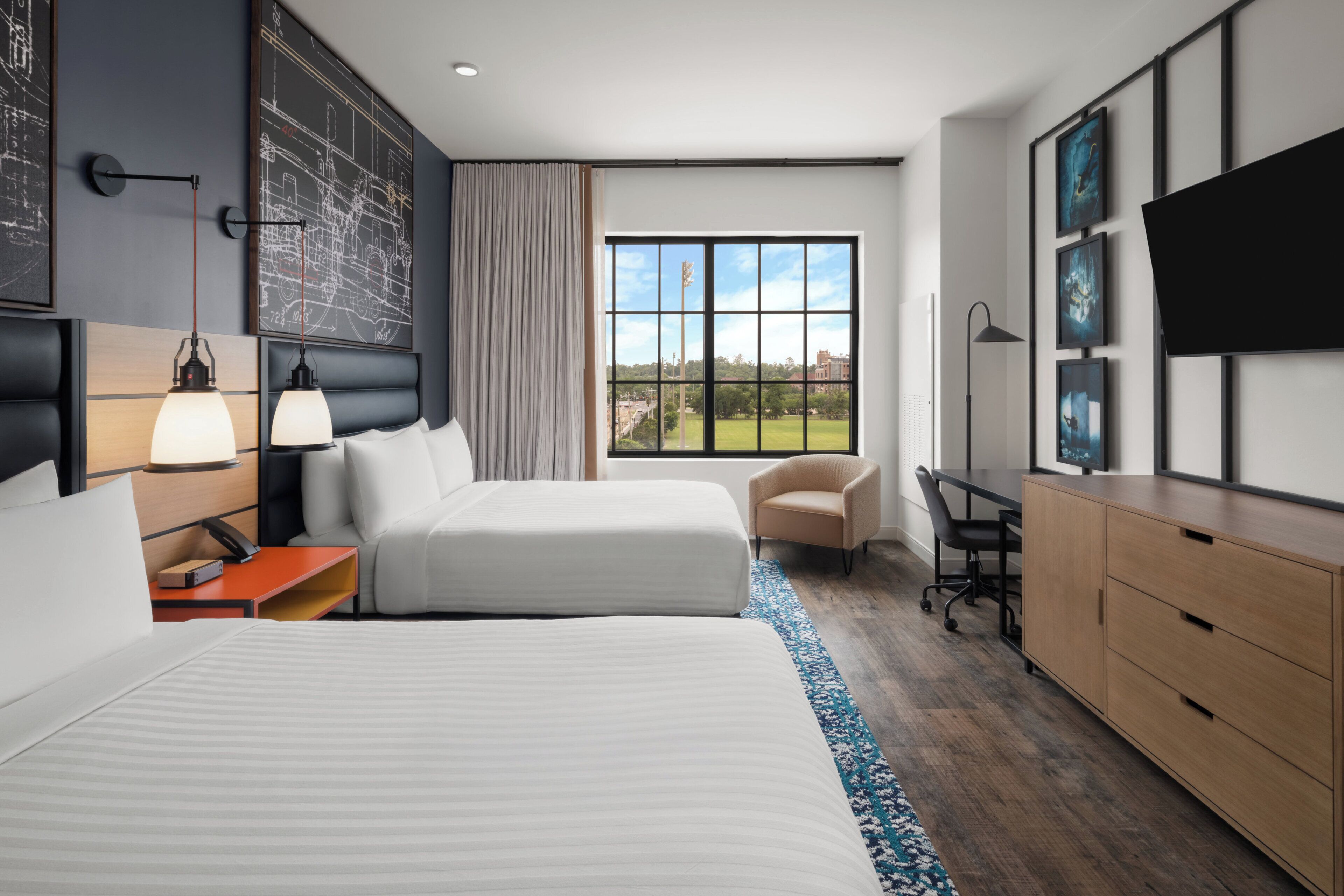 Premium bedding, desk, laptop workspace, soundproofing