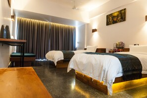 Chambre Confort double ou avec lits jumeaux | Salle de séjour