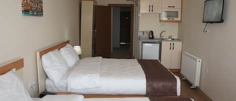 Hypo-allergenic bedding, minibar, in-room safe, desk