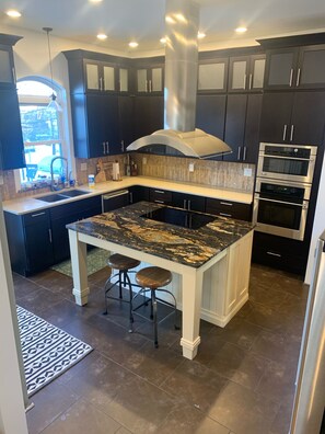 Fridge, microwave, oven, stovetop - Hewitt Onion Tower Victorian charm in heart of Marquette- Cozy Fireplace  (Marquette)