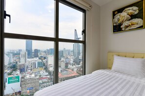 Deluxe Apartment, 2 Bedrooms, City View | Premium bedding, down comforters, pillowtop beds, minibar - Riverside Residence - Saigon Royal (Ho Chi Minh City)