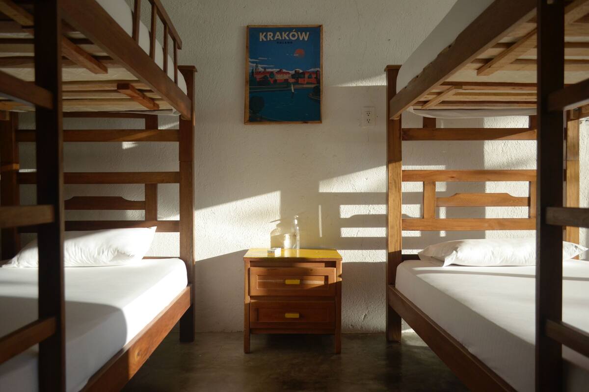 4 Bed Mix Shared Dorm | Premium bedding, desk, laptop workspace, blackout drapes