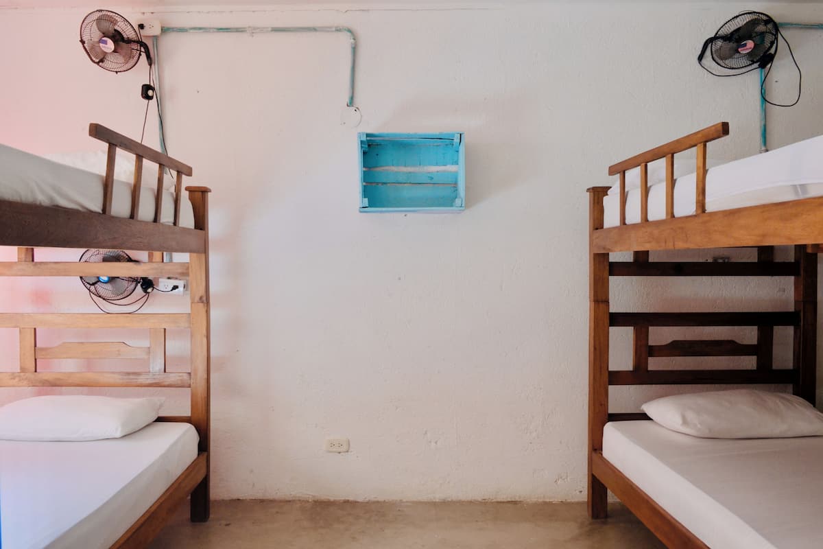 4 Bed Mix Shared Dorm | Premium bedding, desk, laptop workspace, blackout drapes