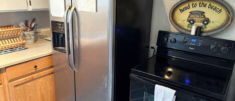 Microwave, coffee/tea maker, cookware/dishes/utensils