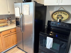 Microwave, coffee/tea maker, cookware/dishes/utensils