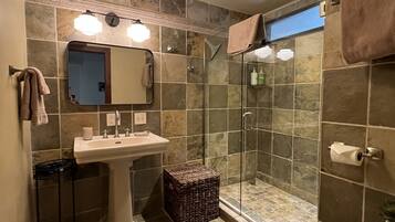 Shower, hair dryer, towels, soap