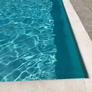 Seasonal outdoor pool, pool umbrellas, pool loungers