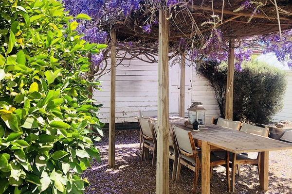 Outdoor dining area with bbq. Dog friendly.