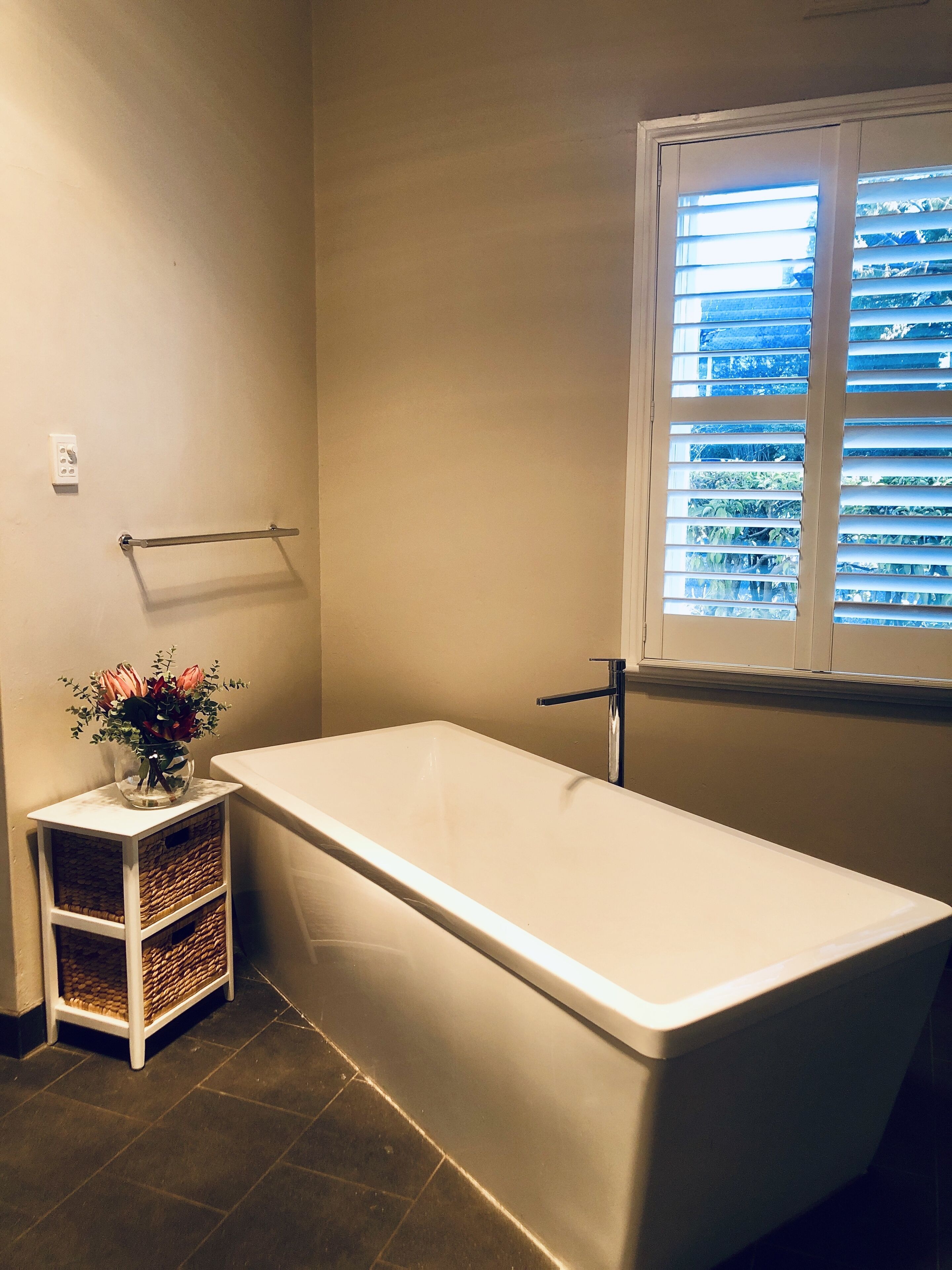 Bathtub, hair dryer, bidet, towels