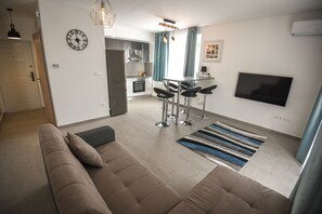 Apartemen Superior | Area keluarga | TV LCD