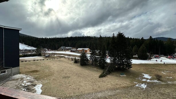 A view of a snowy landscape with buildings and trees. - Studio at the foot of slopes with balcony Corrençon-en-Vercors (Corrençon-en-Vercors)