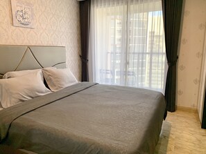 Monolocale Premium, 1 letto king, vista città | Minibar, con stile personalizzato, con arredamento individuale