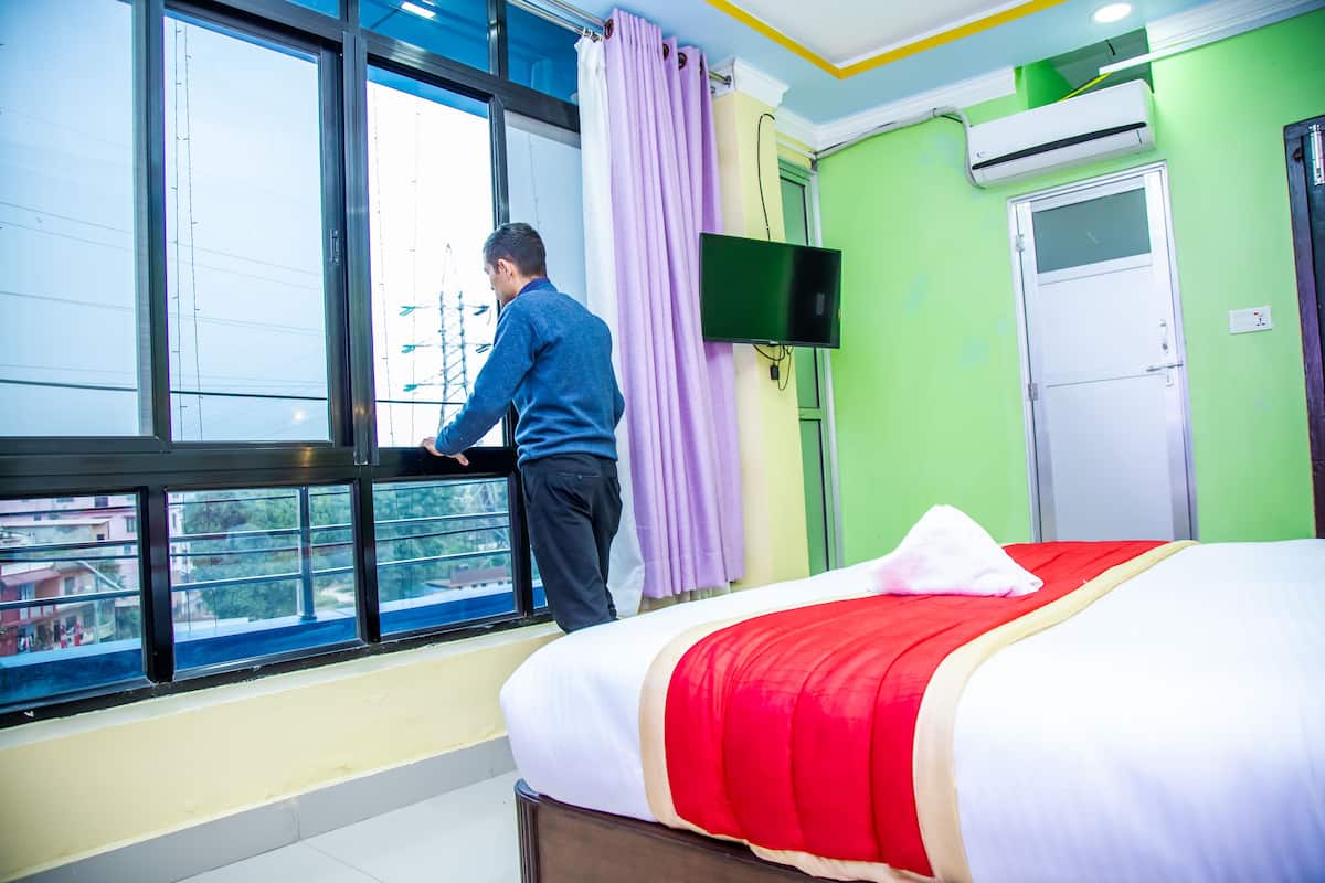 ห้องดีลักซ์ | ห้องเก็บเสียง, เตารีด/โต๊ะรีดผ้า, Wi-Fi ฟรี, ผ้าปูที่นอน