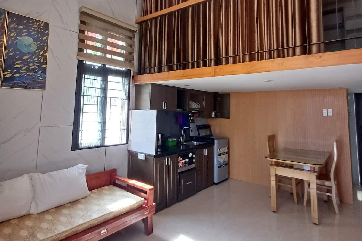 Family Apartment, 1 Bedroom, Smoking, Kitchen | Living area | Flat-screen TV